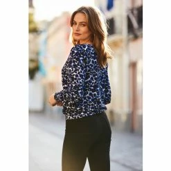 Sosandar Blue Animal Print V Neck Blouson Sleeve Top -Sosandar unnamed file 1764